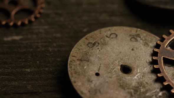 Rotating stock footage shot of antique and weathered watch faces - WATCH FACES 067