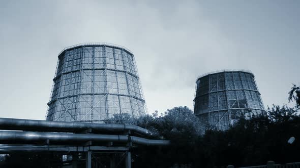 Plant Thermal Power Plant Working with Pipes and Smoke on a Background