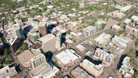 Wide establishing aerial shot over top of Idaho's Boise downtown district.