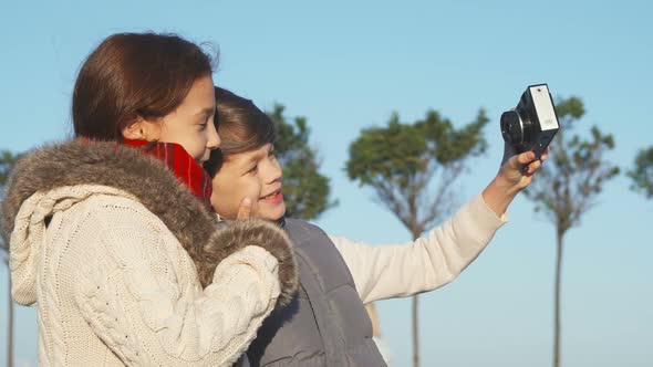 Happy Children Are Doing Selfie on Camera