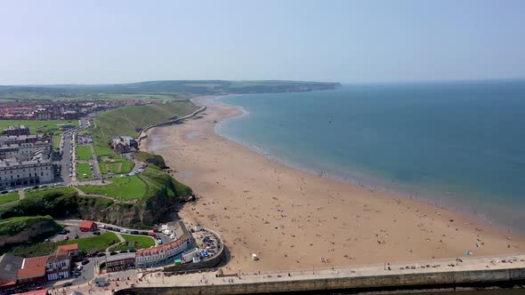 Aerial footage of the beautiful beach and town of Whitby in the UK