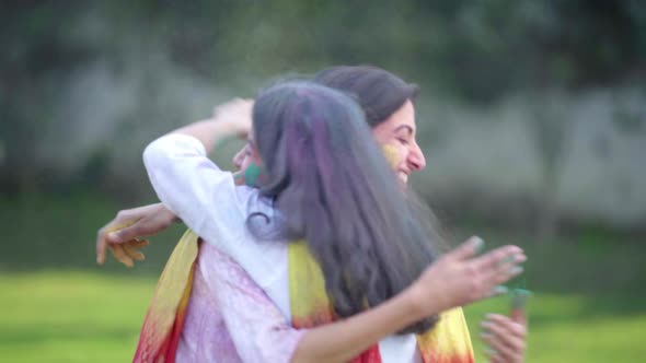 Indian girls congratulating Holi