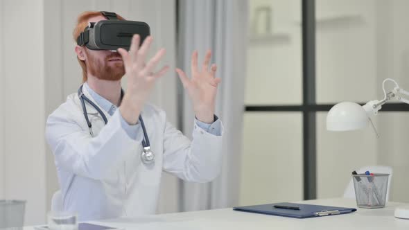 Young Redhead Male Doctor Using VR Set