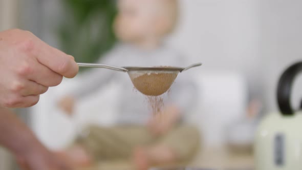 Sieving Cocoa Powder