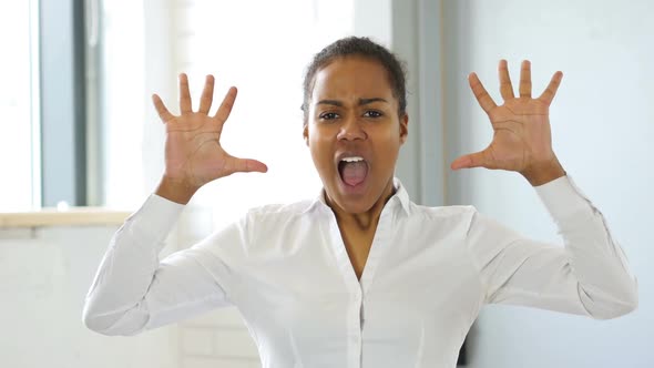 Black Woman Screaming with Frustration