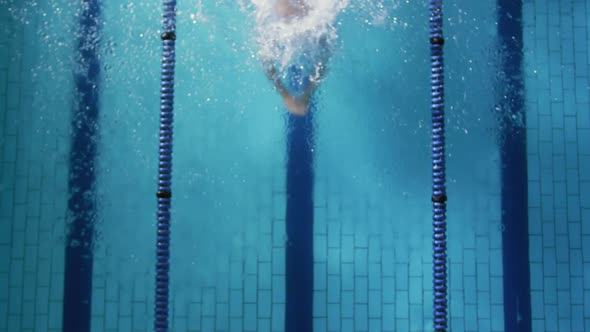 Swimmer training in a swimming pool