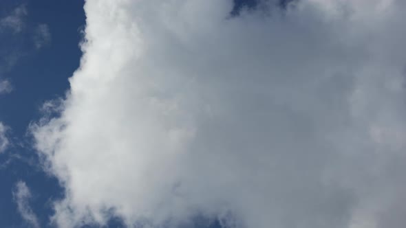 white clouds in blue sky background