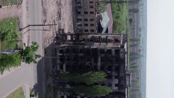 Vertical Video of Civilian Cars Destroyed During the War in Ukraine