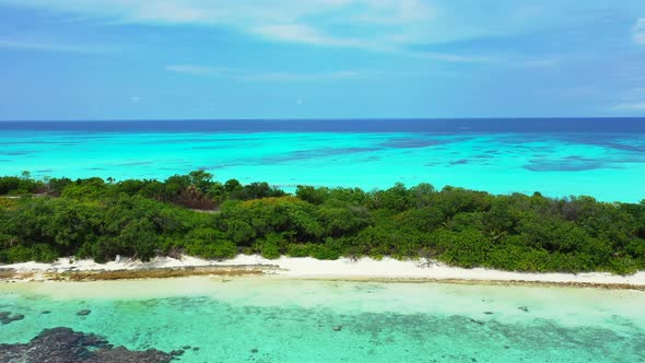 Luxury aerial copy space shot of a summer white paradise sand beach and aqua blue ocean background i