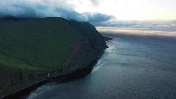 Aerial view of a waterfall at Driftwood Bay, Unalaska, Alaska, United States.