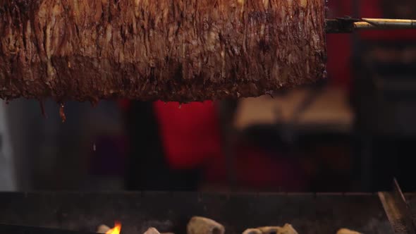 Spicy Marinated Doner Kebab Cooking Over Coals