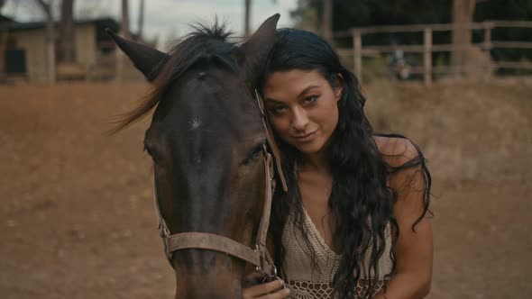 Young Woman Rides a Horse