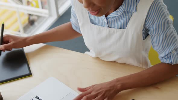 Young woman working in a creative office