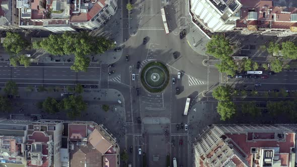 Vehicles Driving Through a Roundabout in Barcelona City Bird's Eye View