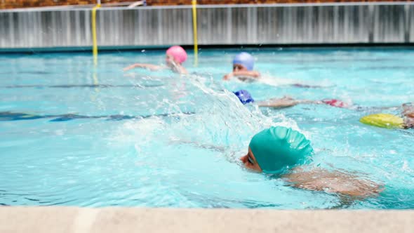 Students swimming in the pool