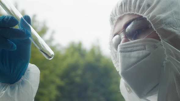 Chemist Wearing Ppe Suits Taking Sample of Tree Bark for Researching Toxicity Testing Examining