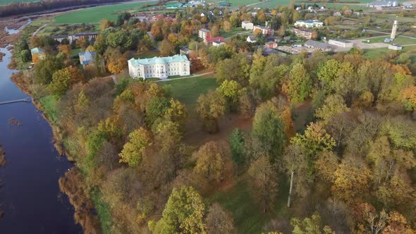 Autumn Aerial Landscape of the City Mezotne and Palace With Park Near Lielupe River, Latvia 4K Video