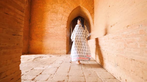 Young Tourist Woman Exploring Old Traditional Burmese Temple. Travel Adventure Lifestyle Vacation