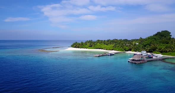 Luxury flying travel shot of a white paradise beach and turquoise sea background in best quality 