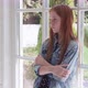 Lonely Sad Girl Standing By Window - VideoHive Item for Sale