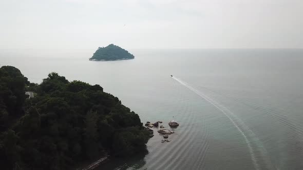 Aerial boat move to the island Pulau Betong from Balik Pulau