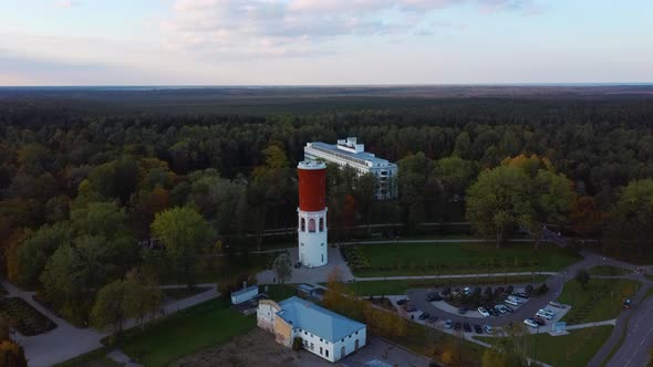 Kemeri Water Tower With Latvian Flag in the Kemeri Resort Park in Jurmala, Latvia. Beautiful White N