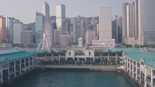 Hong Kong central ferry terminal and harbour front. Aerial drone view