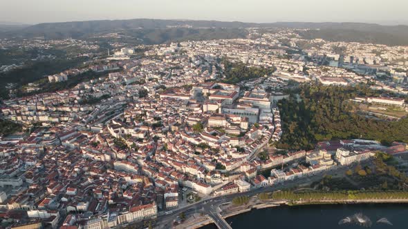 Panoramic view of Coimbra sprawling cityscape with University on top of the hill.