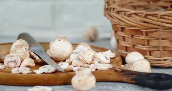 Sliced on a Cutting Board Mushrooms Slowly Rotate. 