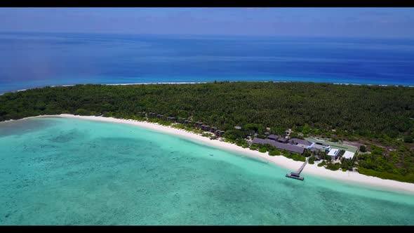 Aerial drone view scenery of beautiful island beach journey by transparent water and white sandy bac