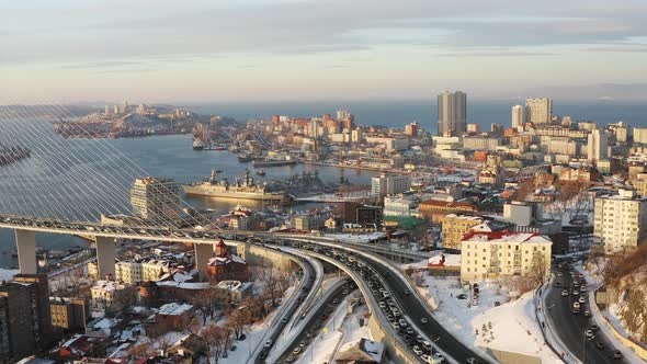 Winter View From a Drone on the Golden Bridge and the City at Sunrise