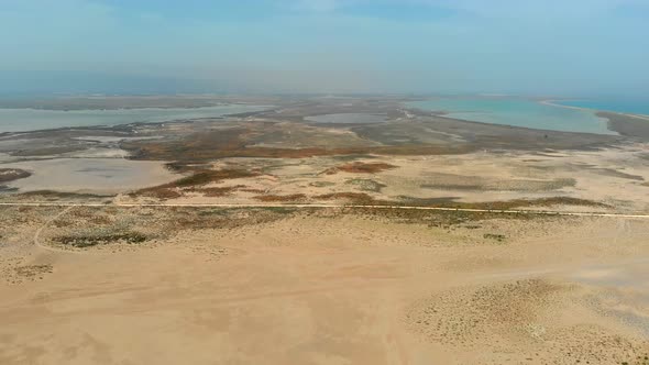 Aerial Vast Desert Sands Adjacent to the Small Lakes and Wetlands