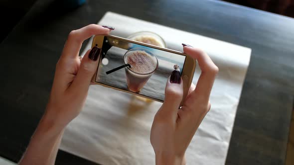 Female Hands Photographing Coffee By Smartphone