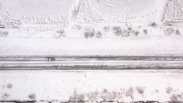 Artic Snowy Road in Iceland, Cars Driving in Winter Time