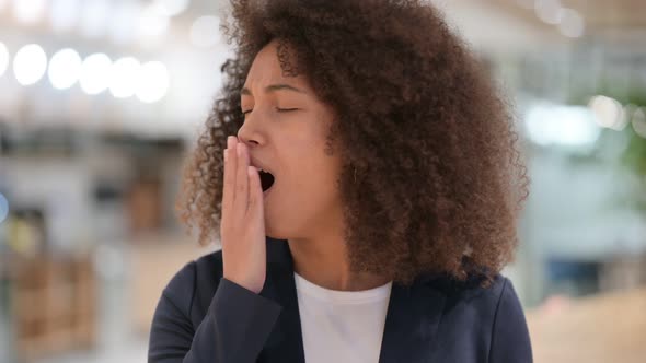 Sleepy Tired Young African Businesswoman Yawning