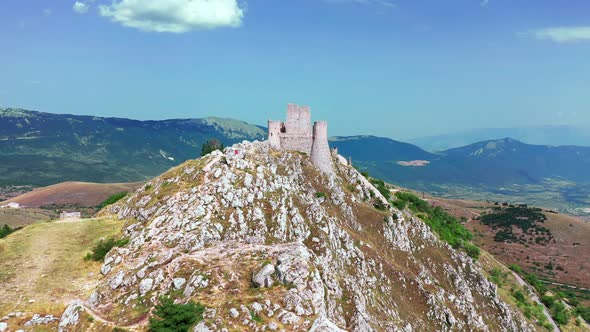 Aerial View of Ancient Castle on Mountain Hill Pine Forest on Mountain Slope