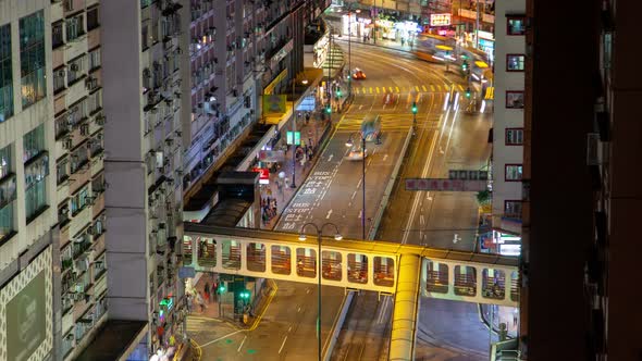 Hong Kong Street with Bridge Between Buildings
