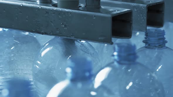 In Production Empty Plastic Bottles Are Filled with Clean Water.
