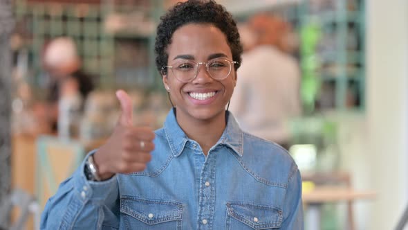 Portrait of Positive African Woman Doing Thumbs Up 