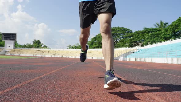 Runner’s Legs Running At The Stadium