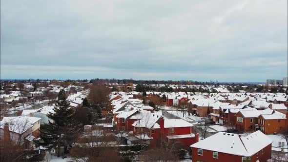 Snowcapped roofs in winter, aerial view