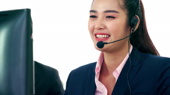 Business People Wearing Headset Working in Office