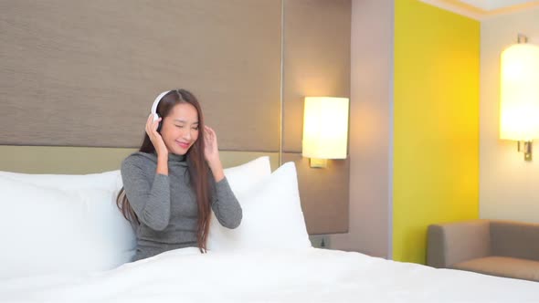 Woman use smart phone for listen music