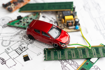 A photograph that expresses the image of a Connected Autonomous Vehicle using a motherboard.