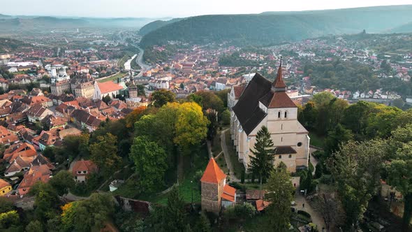 Aerial drone view of the Historic Centre of Sighisoara, Romania. Old buildings