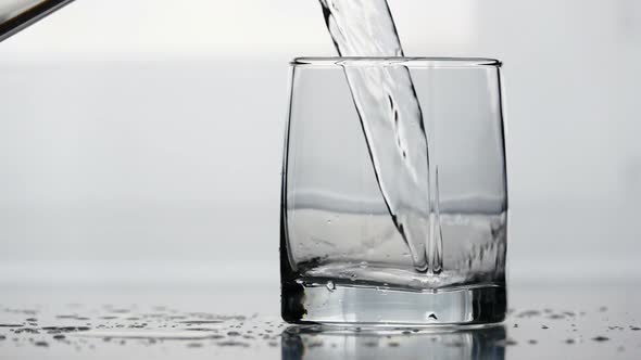 Water Pouring Into Glass Super Slow Motion