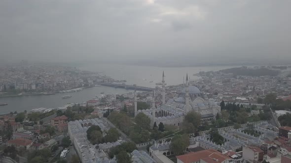 Aerial footage of Suleymaniye Mosque from a foggy day