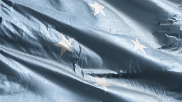 Federated States of Micronesia textile flag waving on the wind. 10 seconds loop.