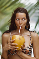 Funny Portrait of Young Beach Woman in a Swimsuit With Fresh Coconut - PhotoDune Item for Sale