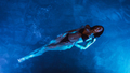 Swimmer woman in swimming pool at night on vacations, view from above - PhotoDune Item for Sale